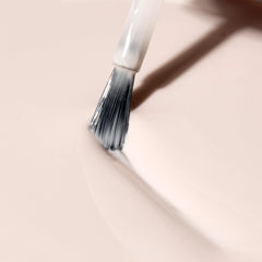 Dazzle Dry Step 3 swatch on nail showing even semi-sheer coverage