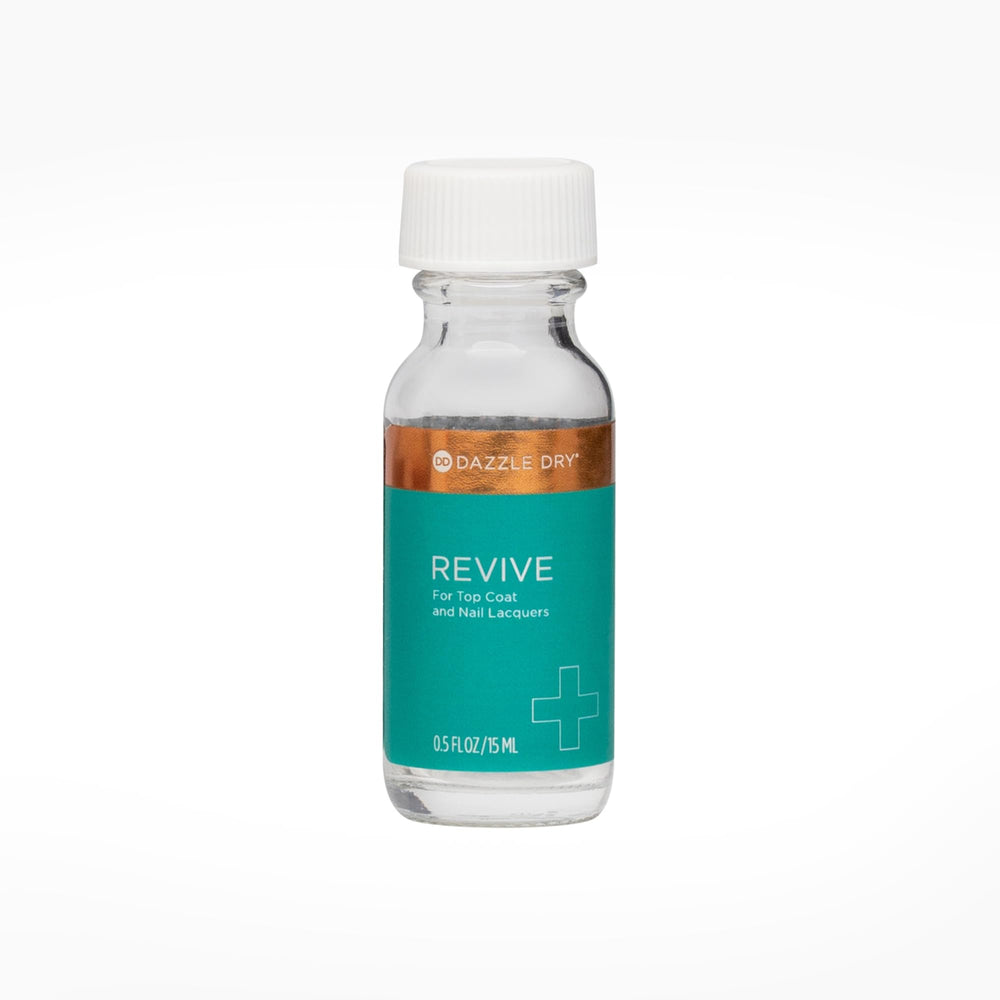 Dazzle Dry Revive bottle demonstrates thinning thick top coats for longer-lasting manicures.