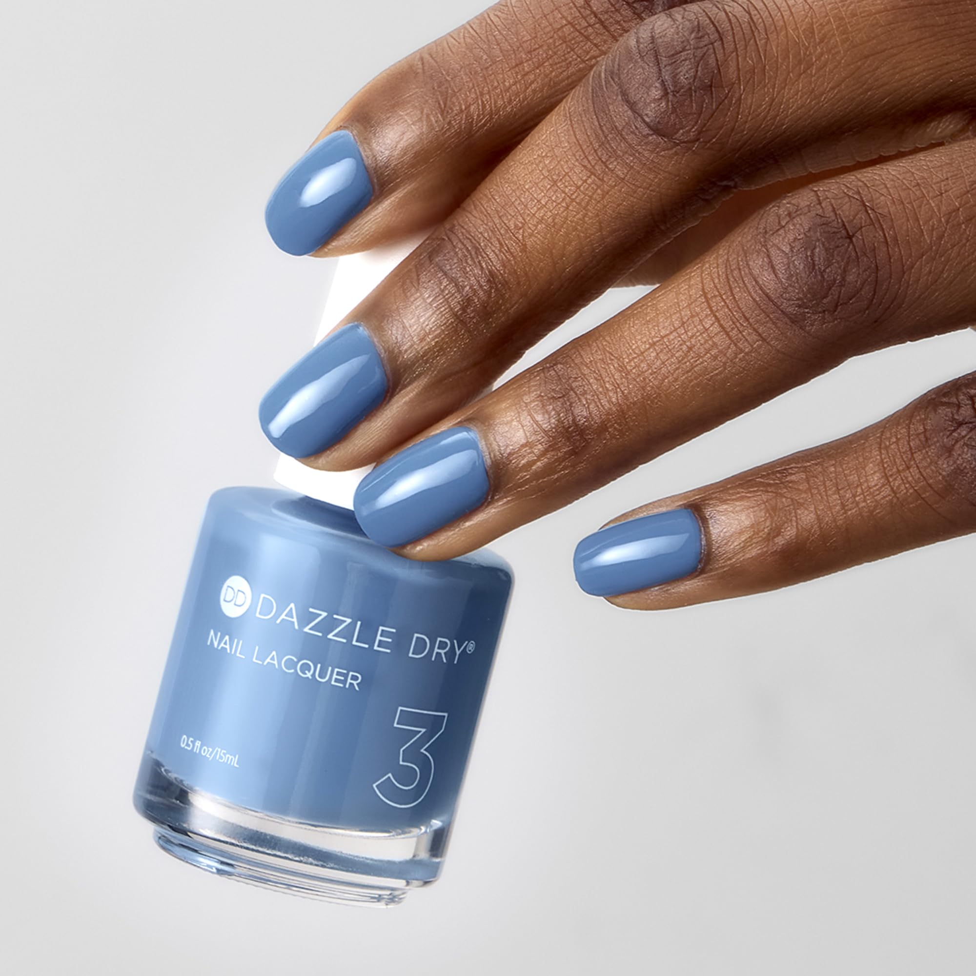 Dazzle Dry fast-drying visual conveys 5-minute air-dry timeline.