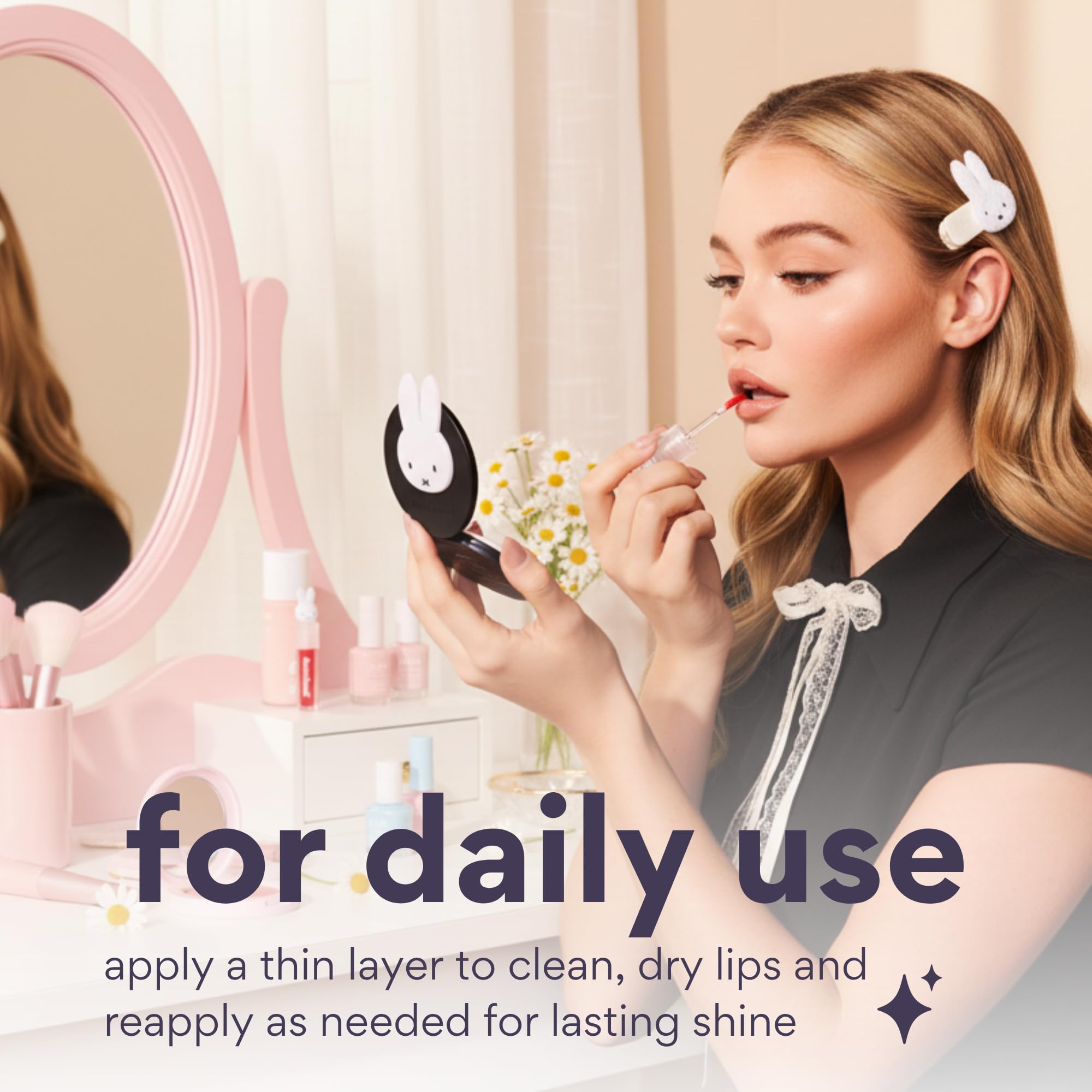 Glossy swatch shows shimmer and tint for everyday wear on lips
