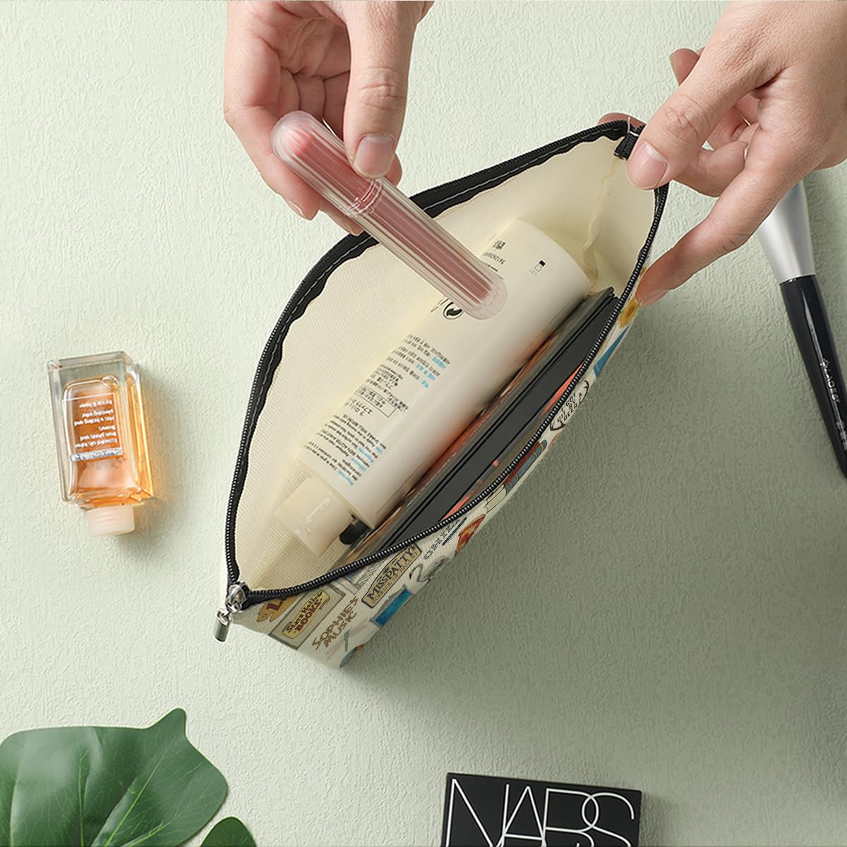 Decohim cosmetic bag with metal zipper closure keeps items secure during travel.