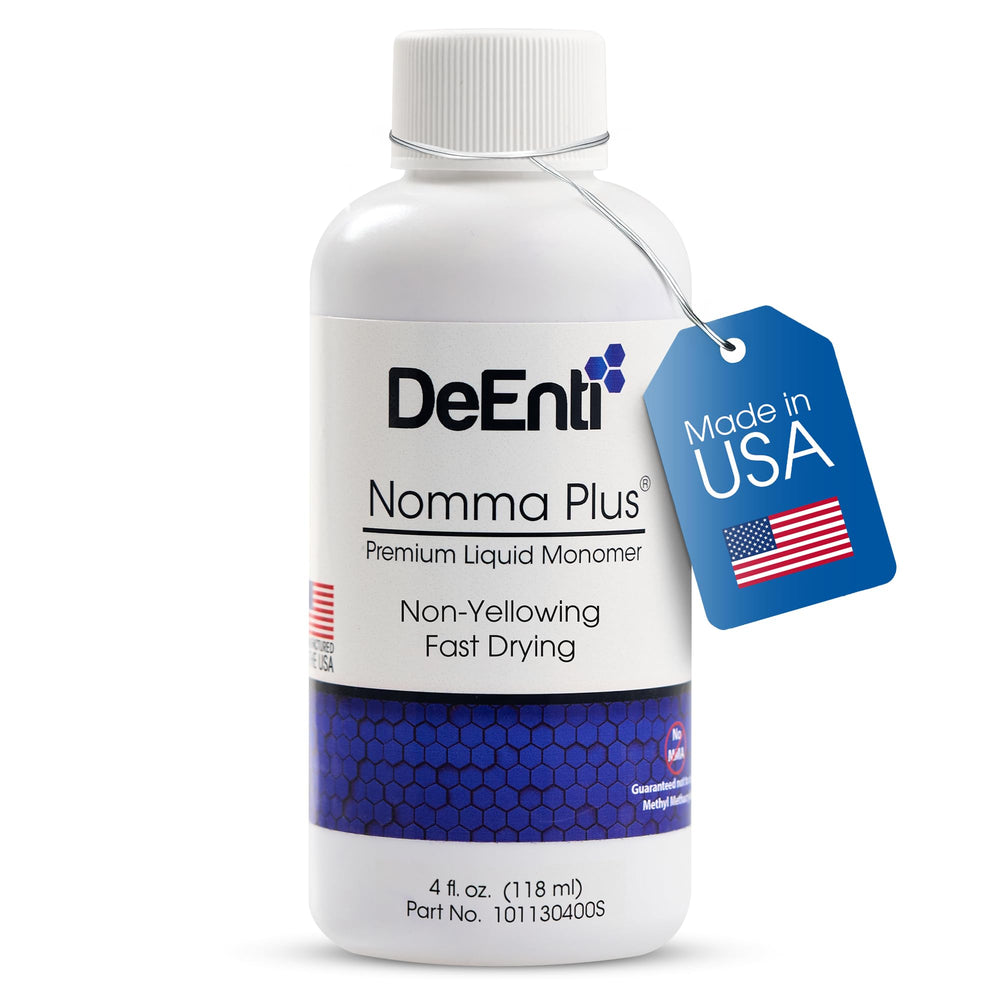 DeEnti Nomma Plus liquid monomer bottle close-up highlighting smooth acrylic application potential.