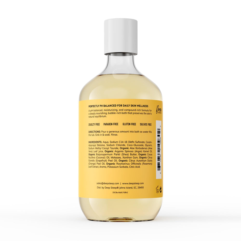 Deep Steep Bubble Bath Grapefruit Bergamot being poured for a fragrant ritual