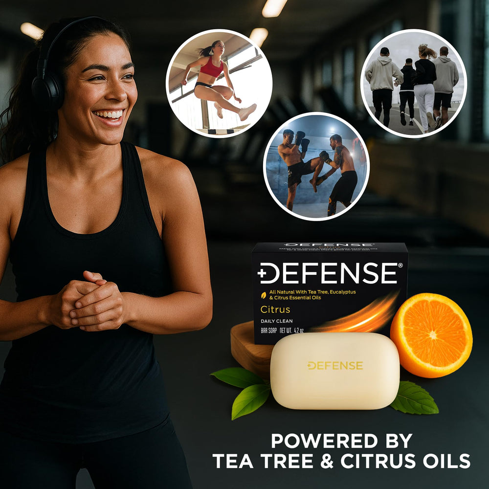 Defense Soap Citrus Bar in hand showing cleansing action after workouts.