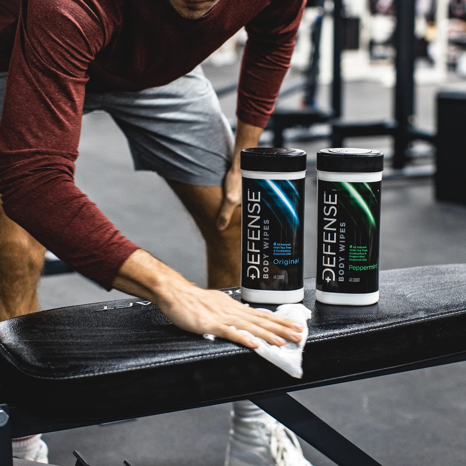 Defense Soap wipes near gym gear demonstrates post-activity clean with no residue.