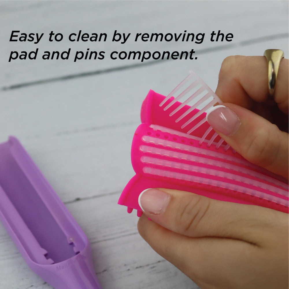Denman D3 soft round-ended pins minimize snag while detangling
