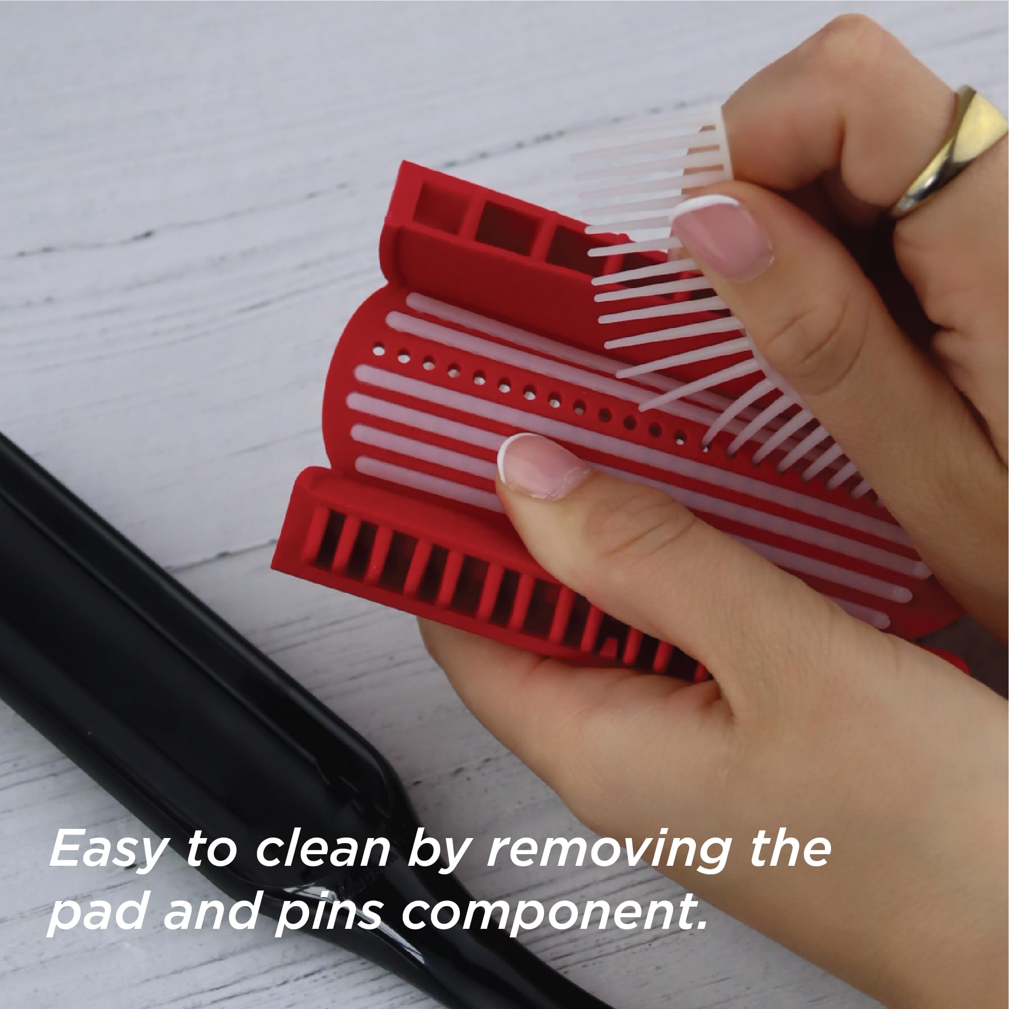 Denman D3 detangling action on curls delivering smoother strands.