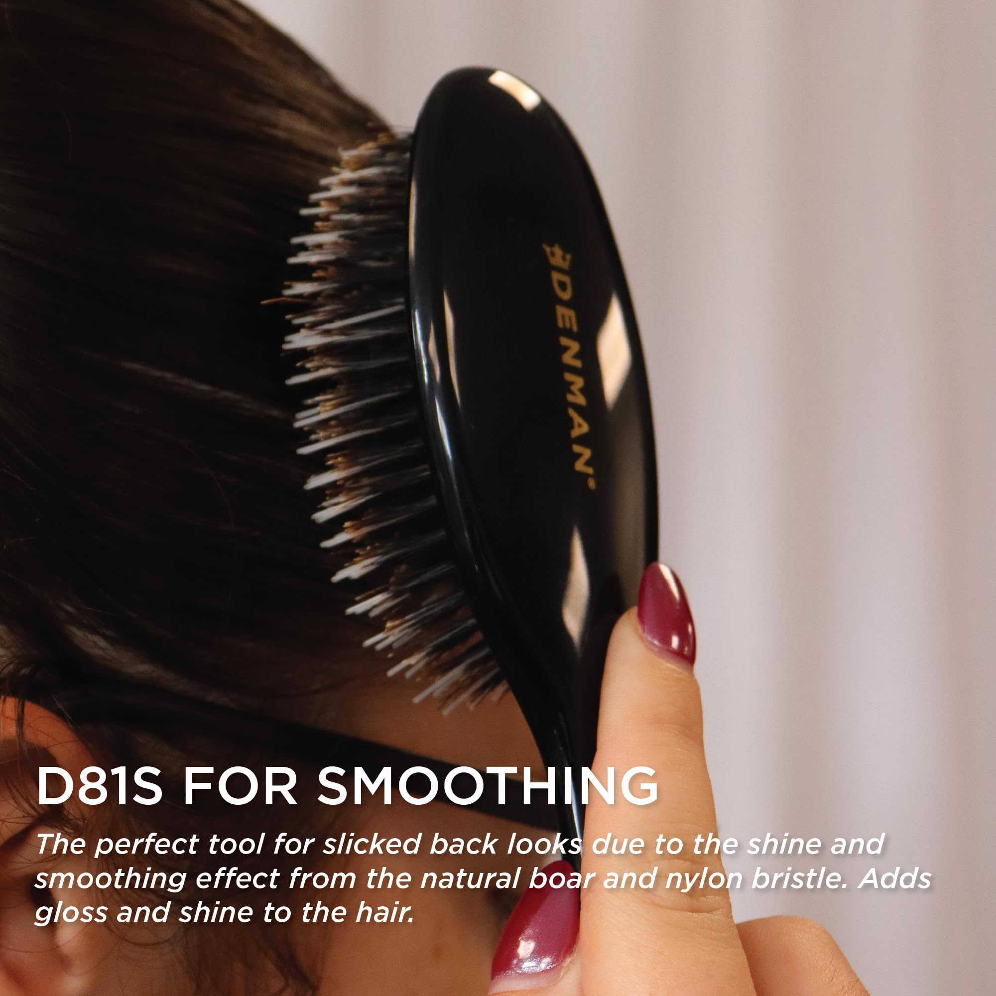 Denman cushion brush small black natural bristle close-up adds conditioning and gloss.