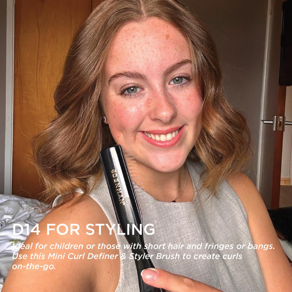 Denman D14 on wet hair defining curls during blow-dry.