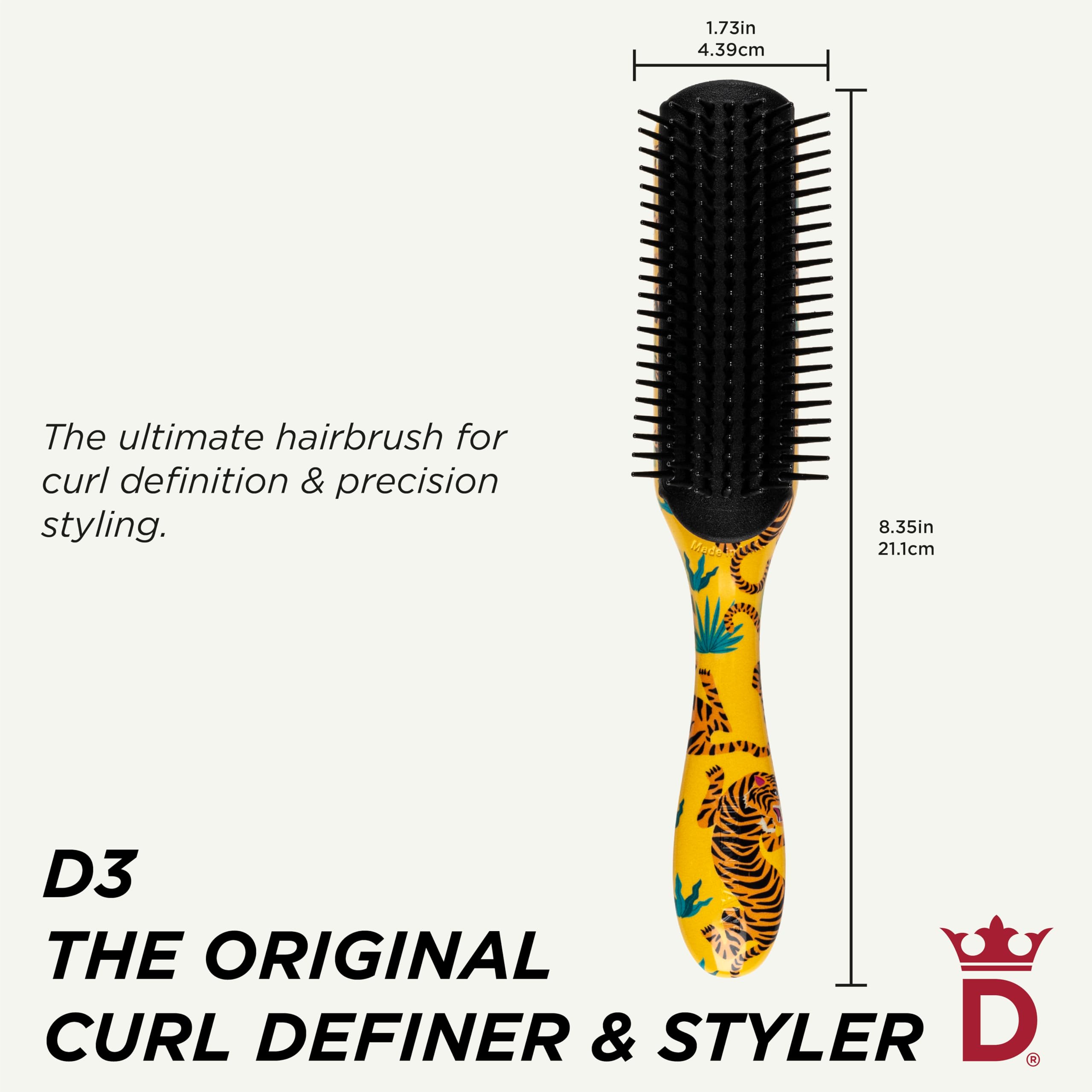 Denman D3 7-Row Brush defining curls on curly hair for smooth, defined results.