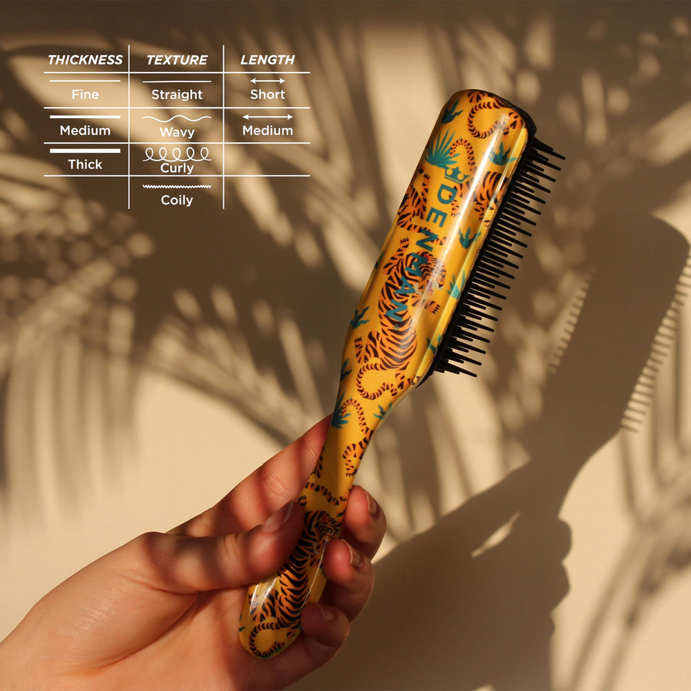 Denman D3 compact, travel-friendly brush design for on-the-go curl styling.
