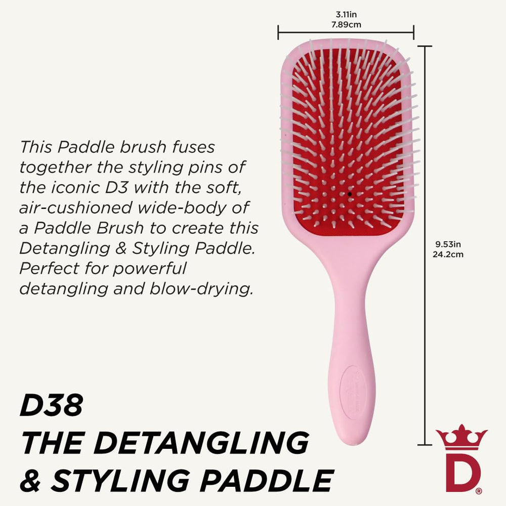 Denman D38 pink paddle brush close-up on Denman pins