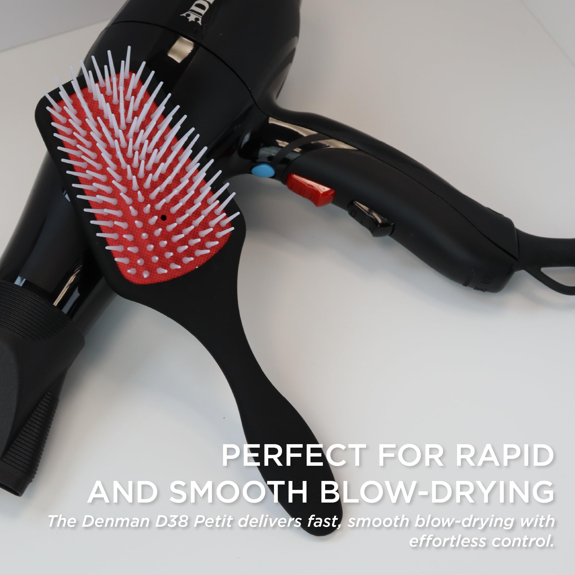Denman D38 paddle brush with round-ended pins closeup reduces snag during styling.