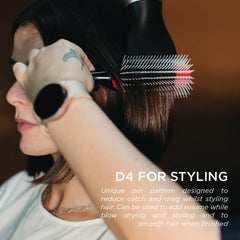 Denman D4 tear-drop handle offers enhanced balance and control