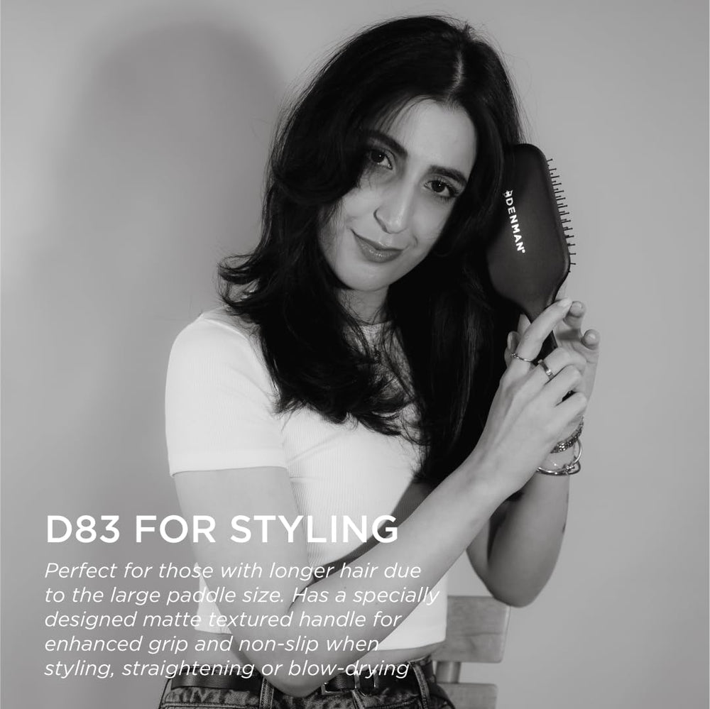 Denman paddle brush comfort grip handle provides secure, ergonomic control during routine styling.