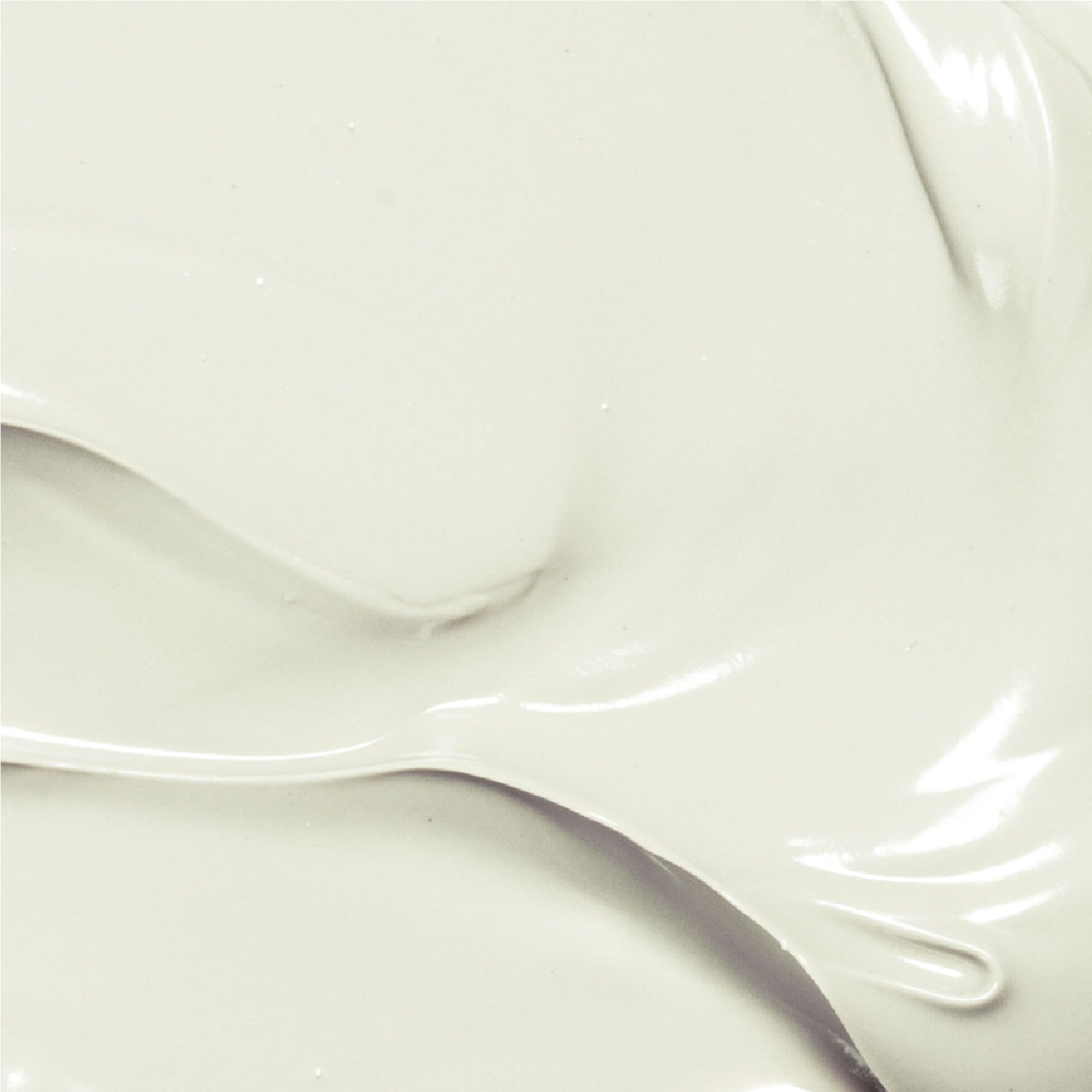 Derma E Skin Brightening Cream creamy texture on palm