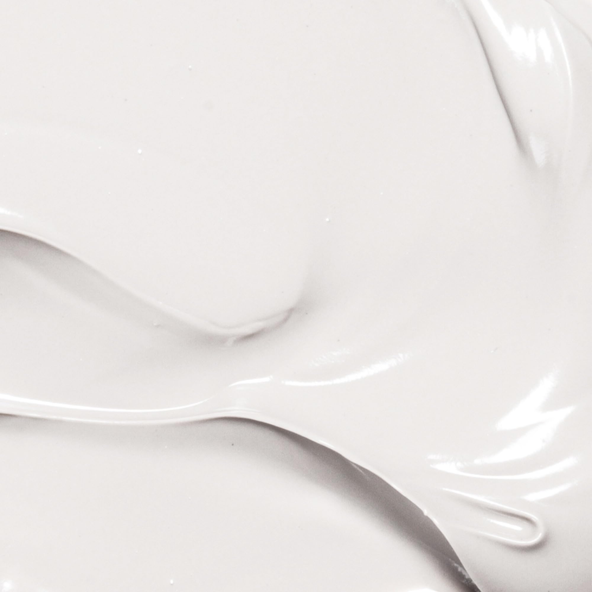 Derma E Vitamin E 12,000 IU Cream on hands for daily moisture and softening.