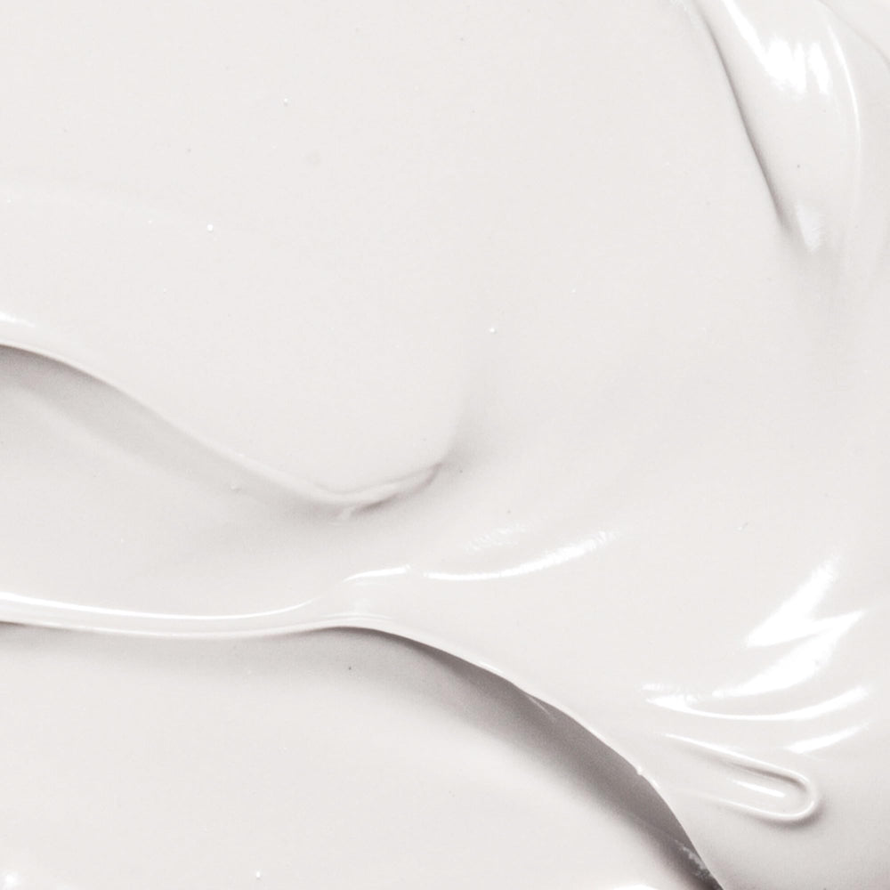 Derma E Vitamin E 12,000 IU Cream on hands for daily moisture and softening.
