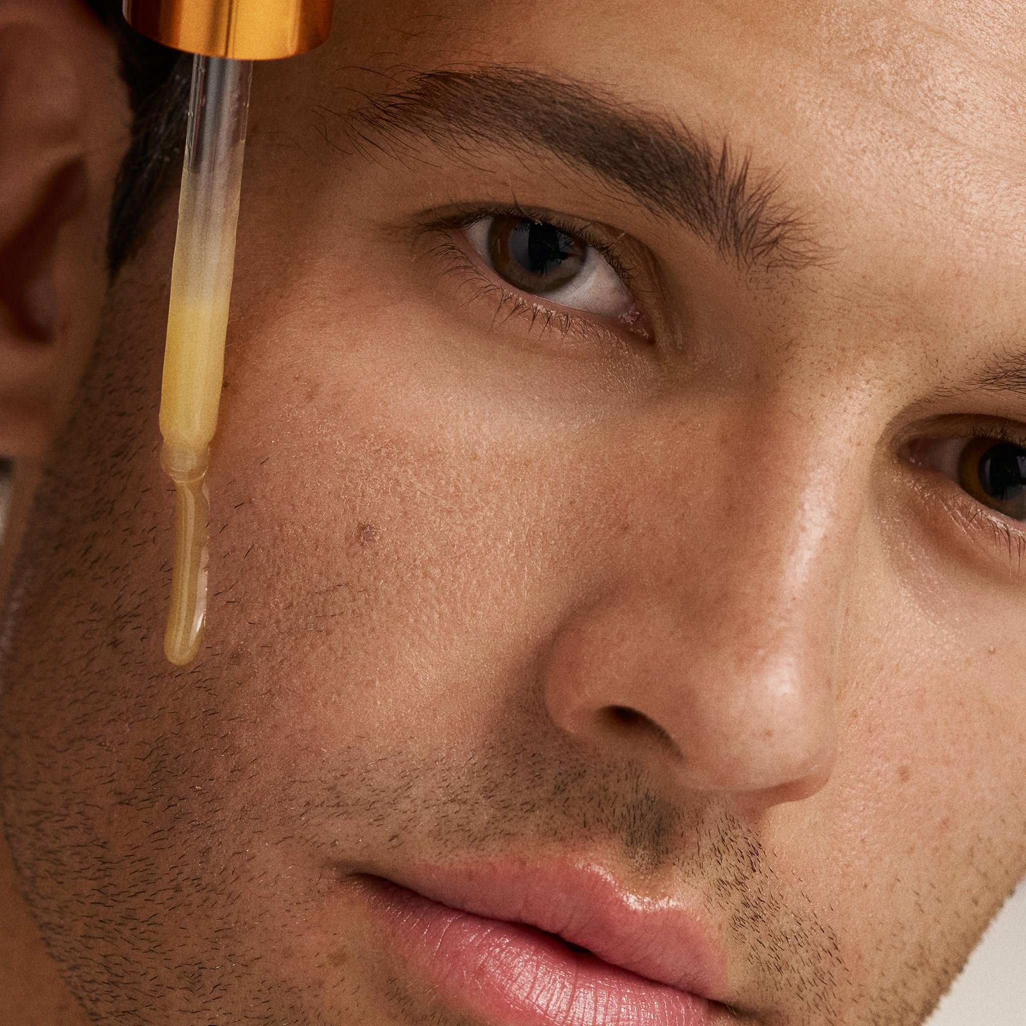 Dermalogica Biolumin-C Serum being applied to cleansed skin for quick absorption.