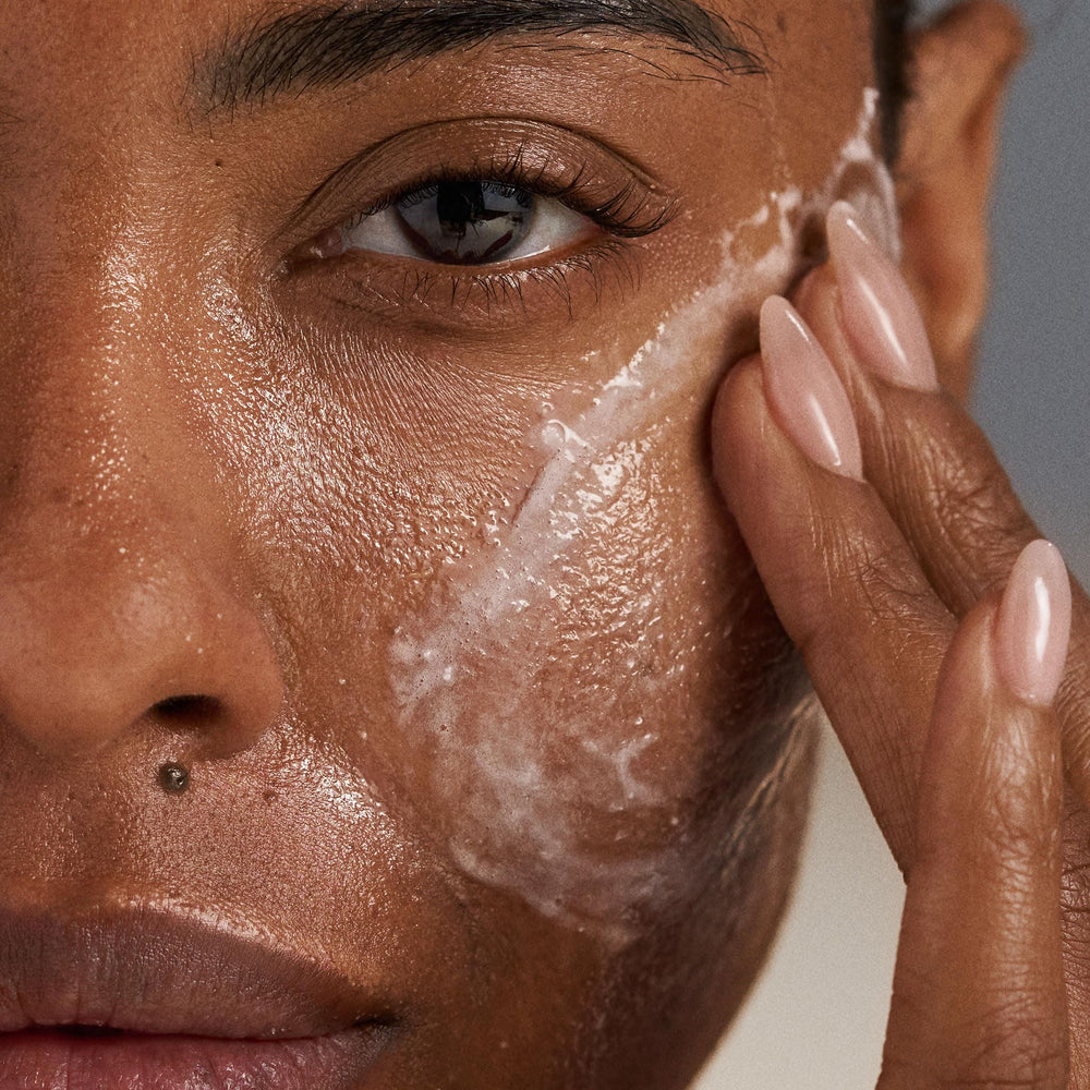 Dermalogica Daily Glycolic Cleanser ingredients highlighted calendula and jojoba for soothing nourishment.