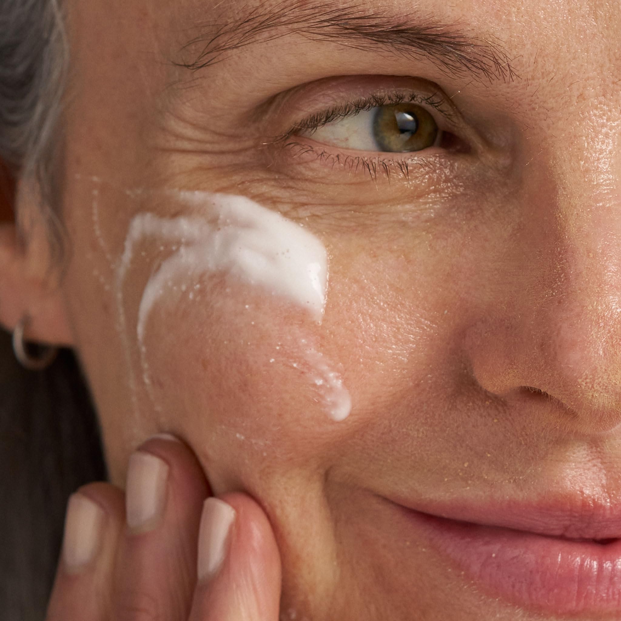 Dermalogica Skin Resurfacing Cleanser texture closeup highlights gentle exfoliation for refined skin.