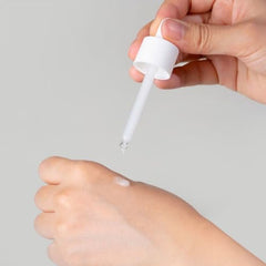 DERMALOGY Real 15% Niacinamide Serum applied on skin for smooth, even tone