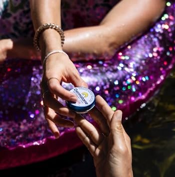 Dermatone Skin Protection Balm SPF 30 tin label focuses on clear zinc formula for sensitive skin.