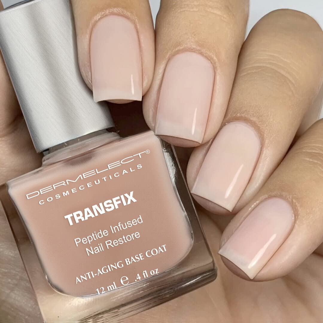 Dermelect Transfix brush applying base coat on nail for a smooth foundation.