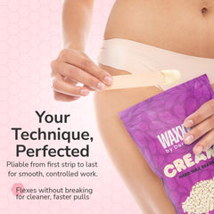 Dermwax WAXXED beads showing soft, workable texture enabling even, consistent removal.