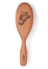 Desert Breeze Pear Wood Handle close-up, highlighting lightweight, durable grip for long brushing sessions.