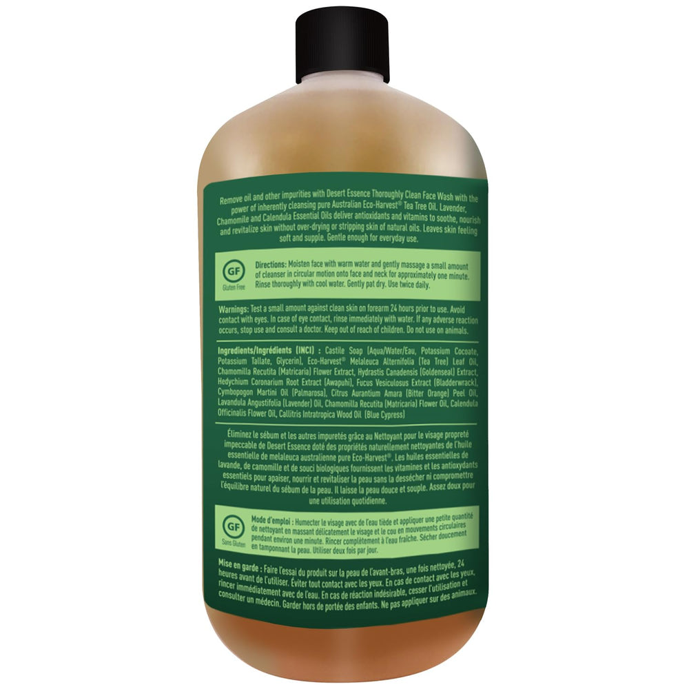 Desert Essence 32-ounce bottle displayed on bathroom counter.