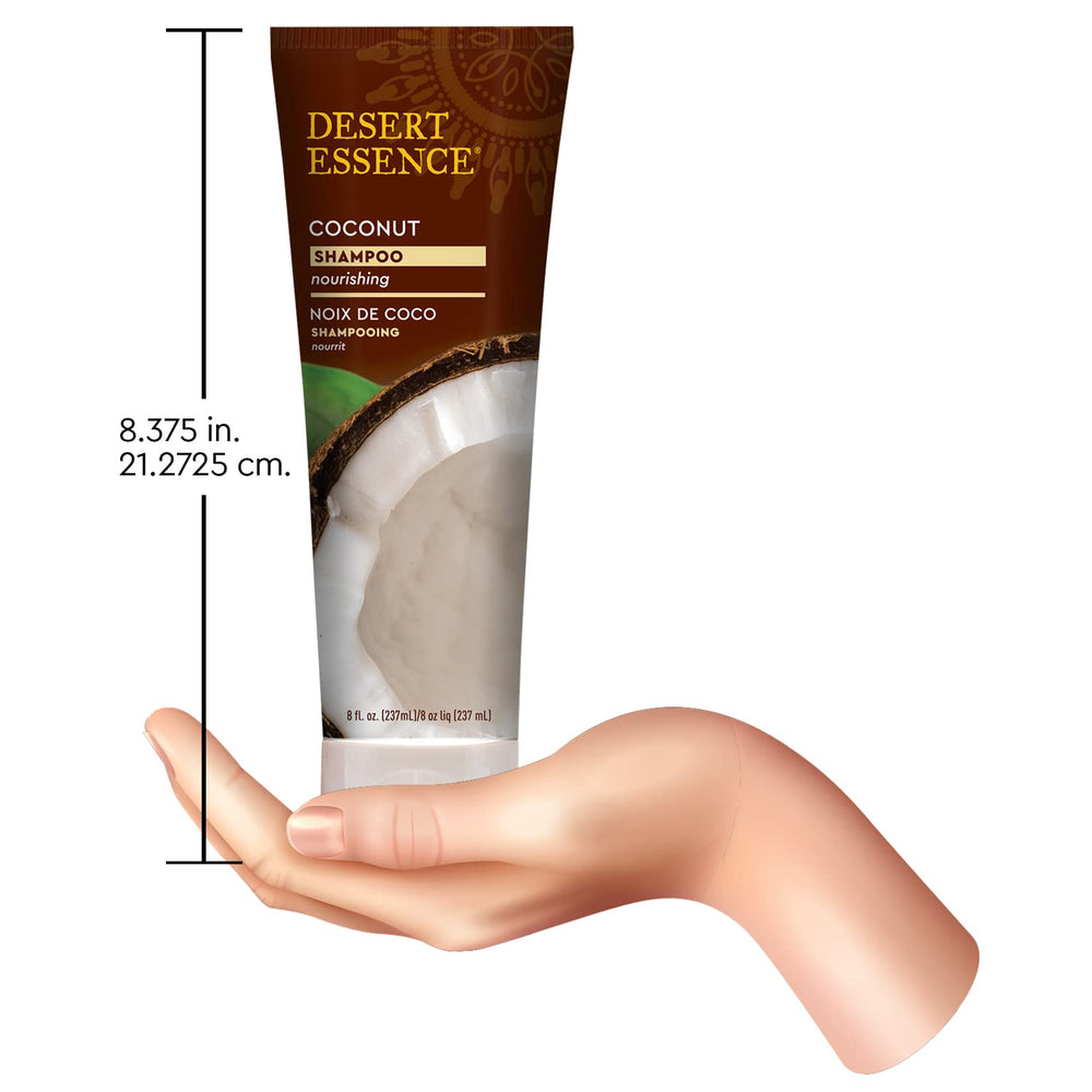 Desert Essence Coconut Shampoo bottle in bathroom aids daily moisture and manageability