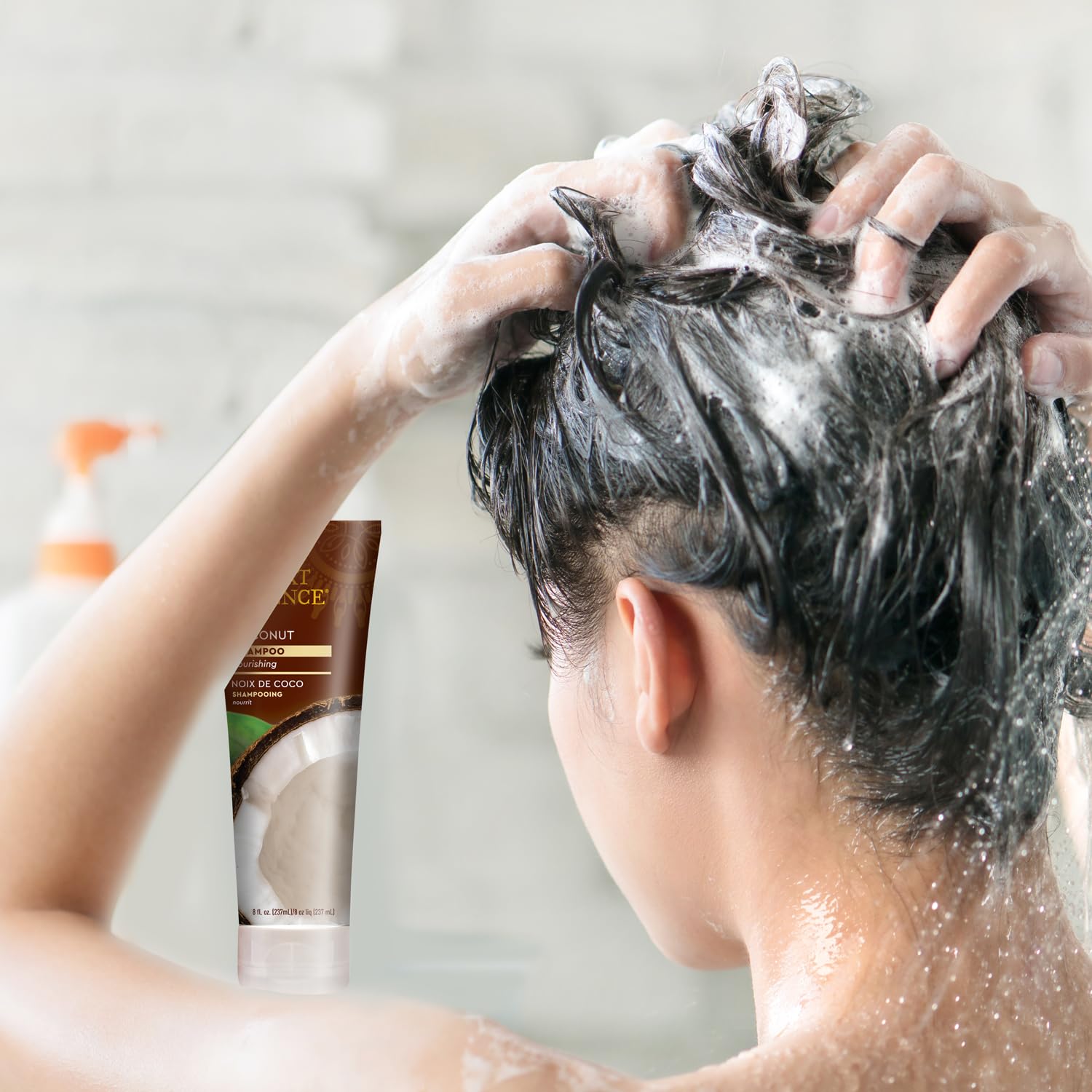 Desert Essence Coconut Shampoo packaging close-up emphasizes vegan and paraben-free formulation