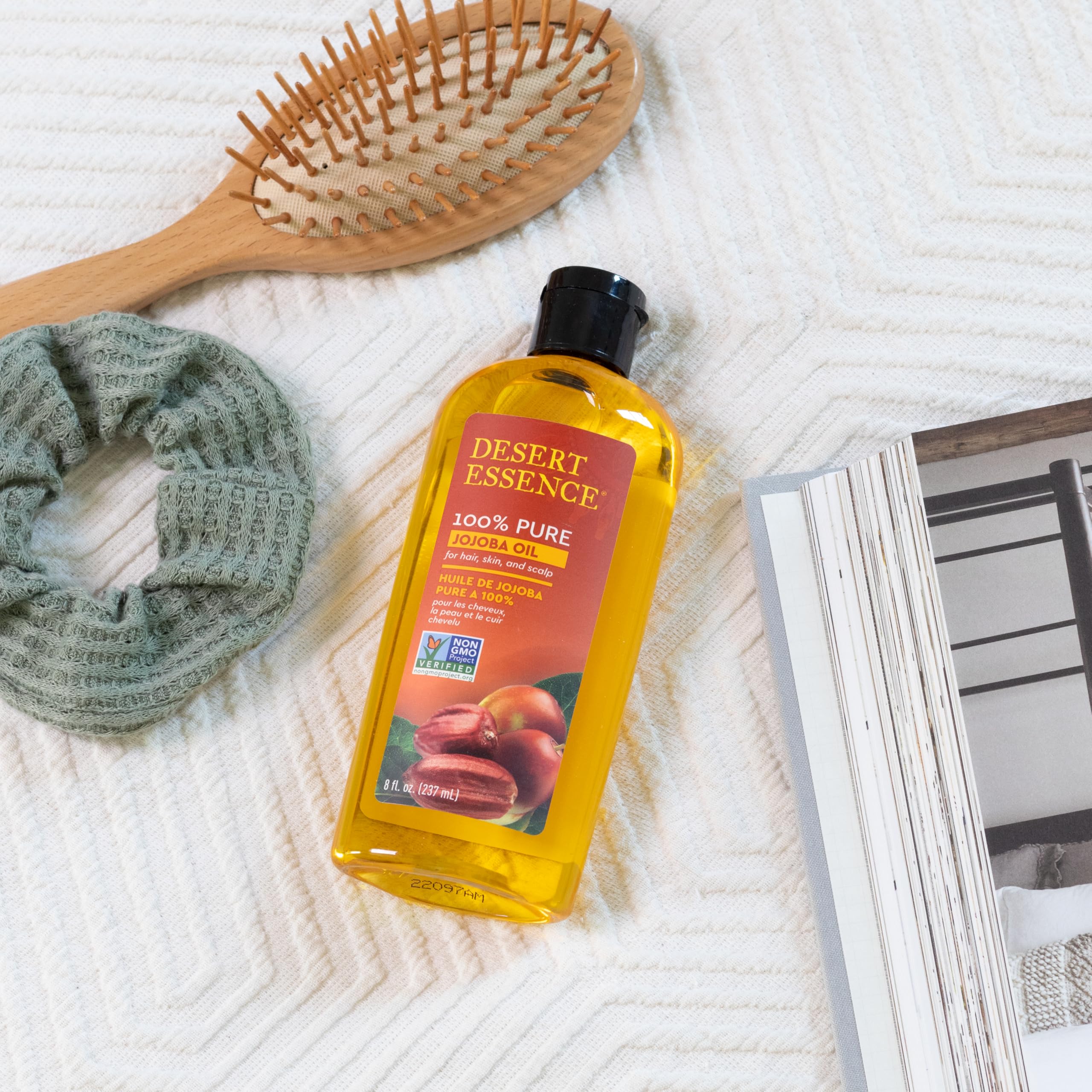 Desert Essence Jojoba Oil pour close-up for easy application