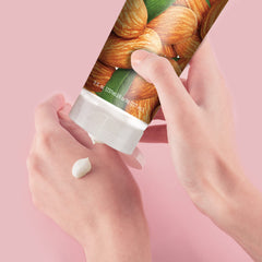 Desert Essence lotion pump application showing easy spread and non-greasy absorption.