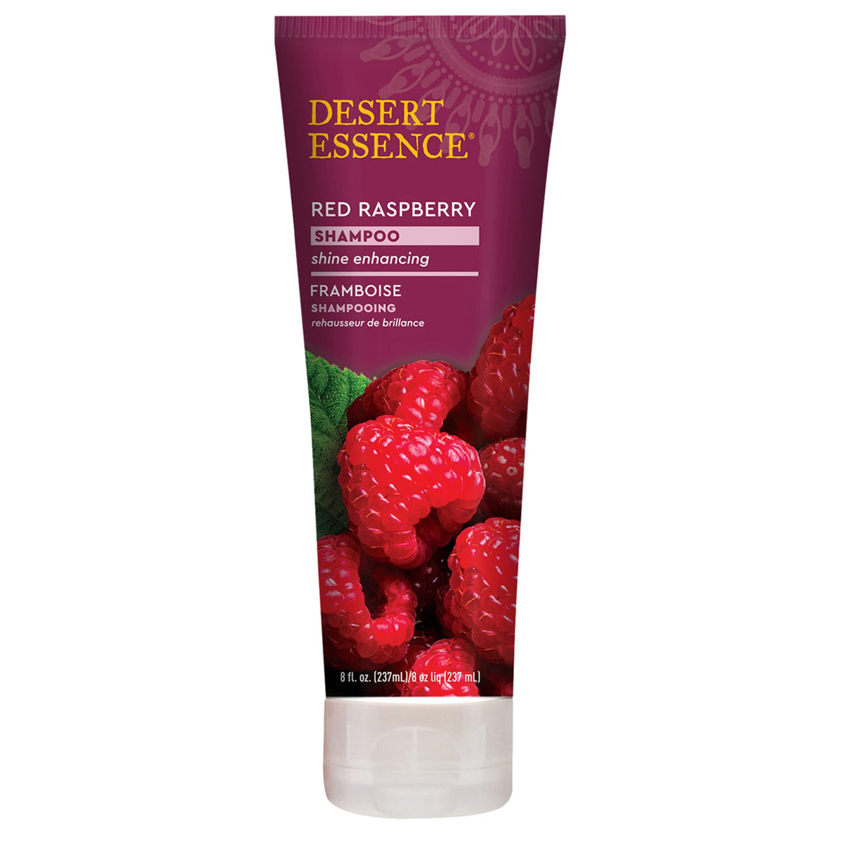 Desert Essence Red Raspberry Shampoo bottle highlights shine-enhancing formula.