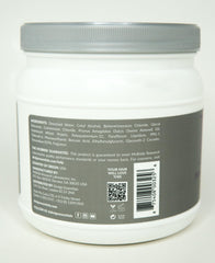 Design Essentials Almond Butter Express bottle dispensing smooth conditioner for even application.