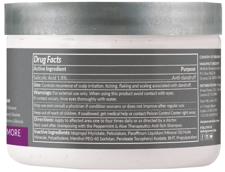 Design Essentials Peppermint & Aloe Therapeutics label close-up showcasing soothing ingredients for scalp.