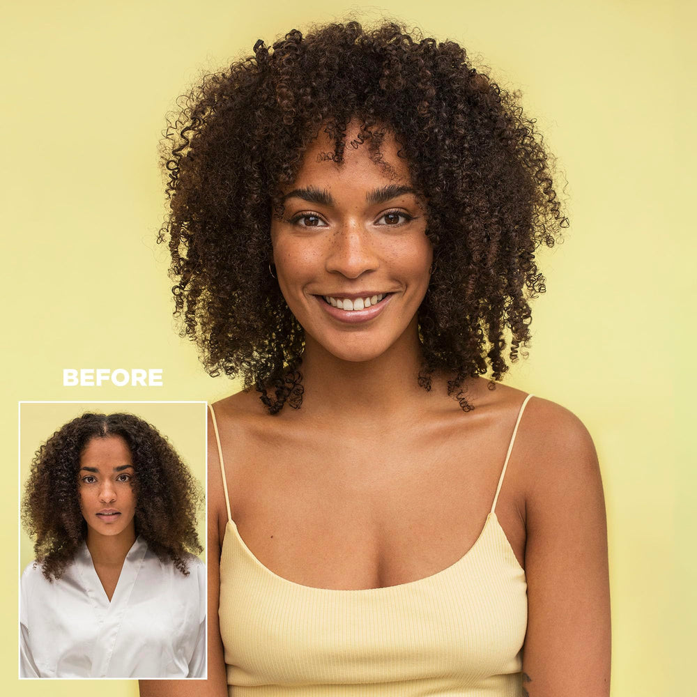 Design.Me Bounce.Me hands applying spray for even coverage on curls