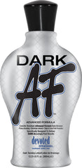 Devoted Creations Dark AF bottle applying transfer-resistant bronzer for deep bronze color.