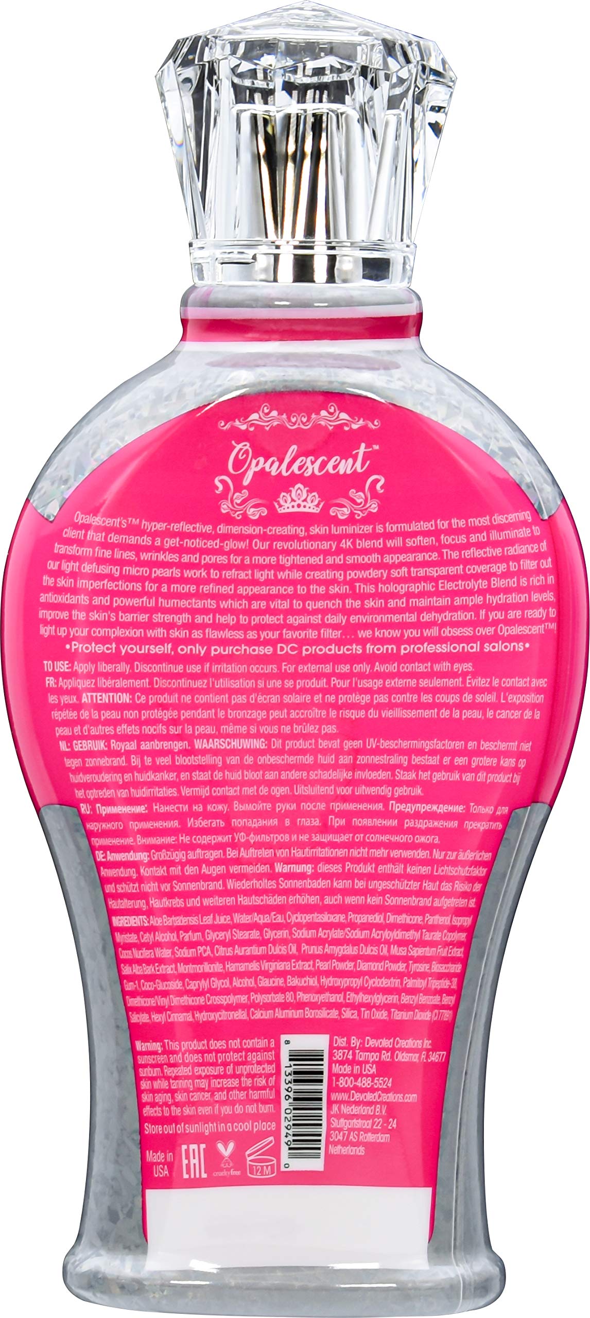 Devoted Creations Opalescent Tanning Lotion on skin, shimmering with holographic micro-spheres and fade protection.