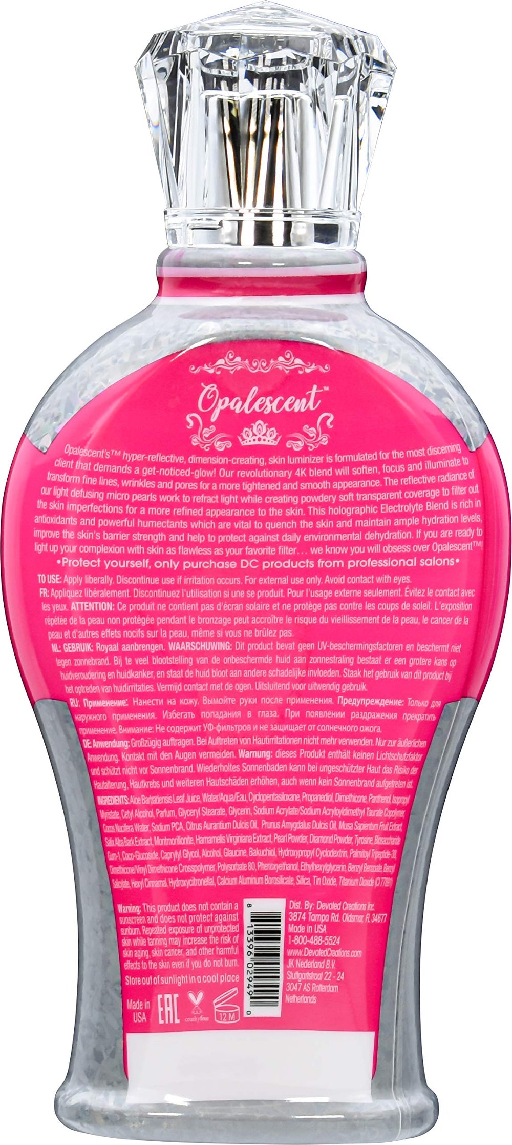 Devoted Creations Opalescent Tanning Lotion on skin, shimmering with holographic micro-spheres and fade protection.