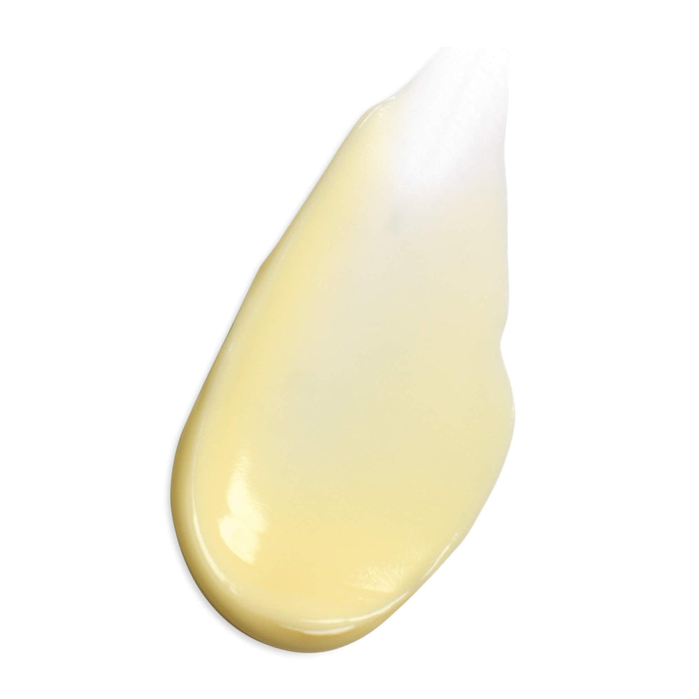 DHC CoQ10 Eye Cream bottle packaging on a vanity reflects clean, simple skincare.