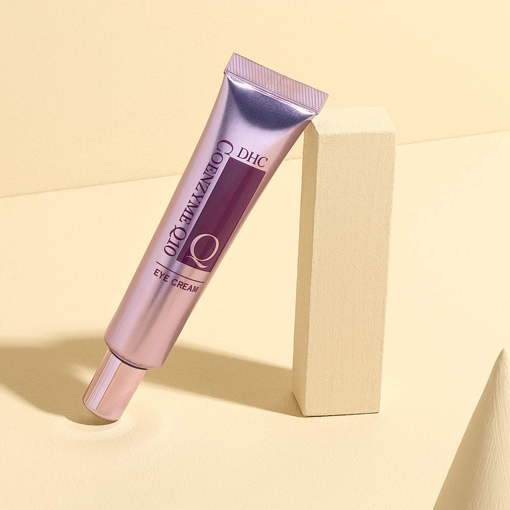 DHC CoQ10 Eye Cream compact jar ready for travel and daily use.