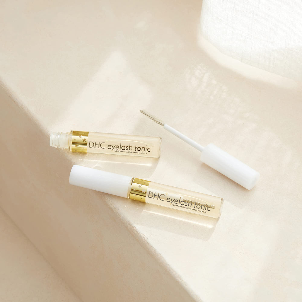 DHC Eyelash Tonic 2-pack display on clean vanity