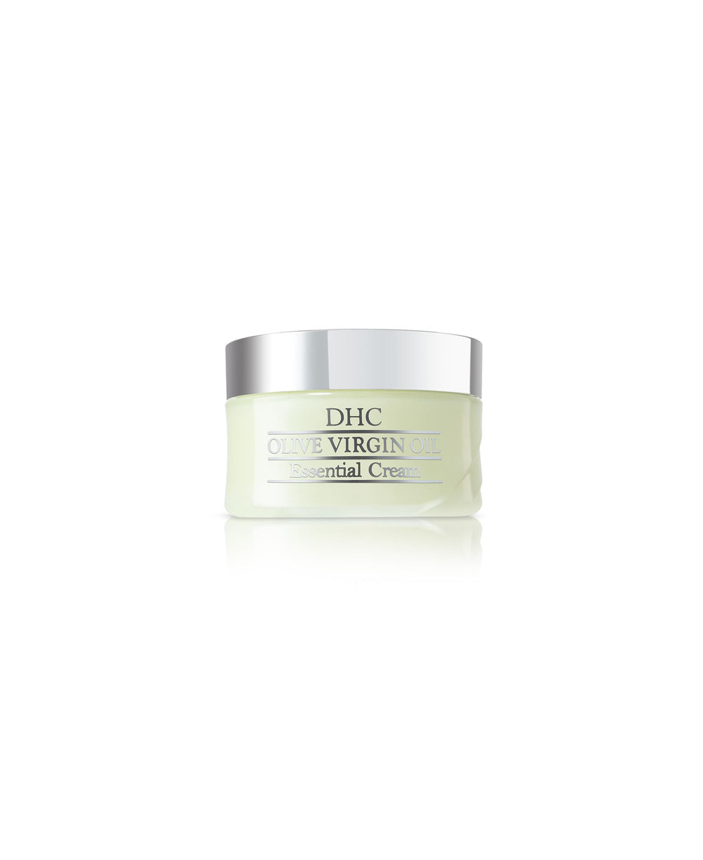 DHC Olive Virgin Oil Essential Cream tube closeup showing rich hydration for all skin types.