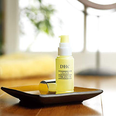 DHC Olive Virgin Oil texture closeup shows a light, non-greasy finish