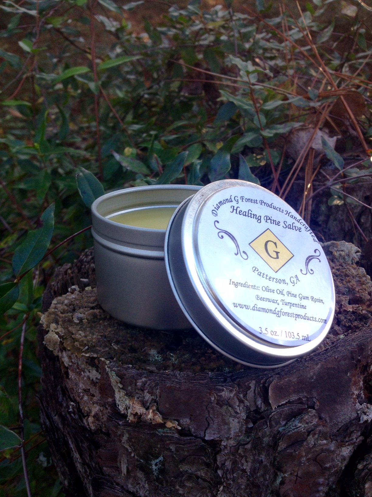 Diamond Healing Pine Salve in hand applying for everyday relief.
