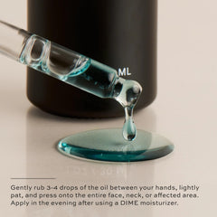DIME Beauty Blue Facial Oil being applied with gentle patting technique