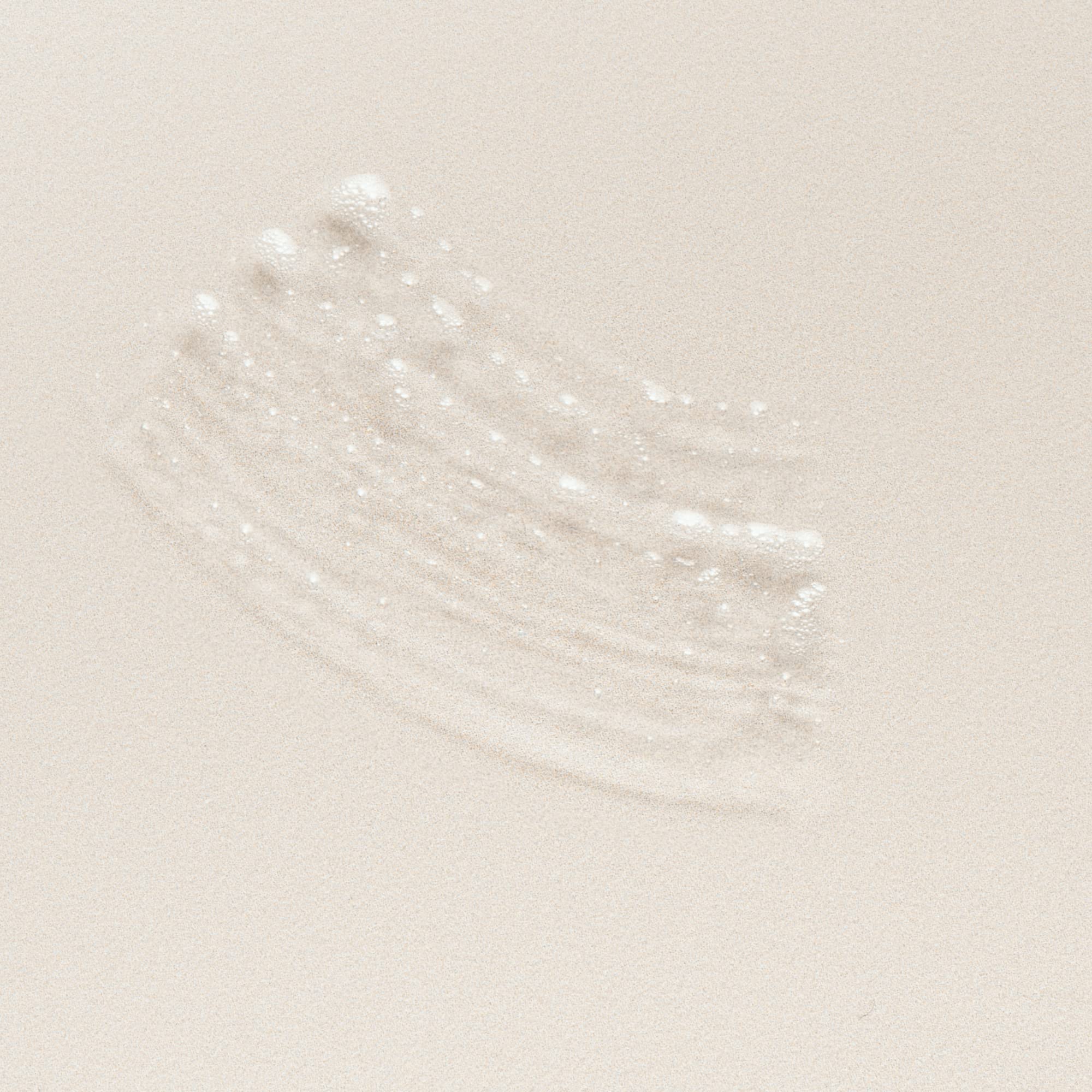 DIME Beauty Eyebrow Enhancing Gel texture close up reveals lightweight gel